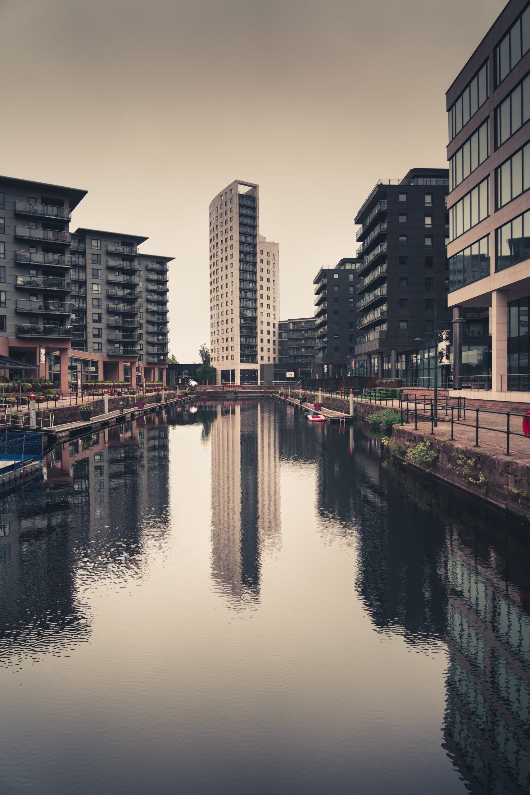 Jonny Gios Photo of Canal in Leeds showing tall buildings and reflection in the water